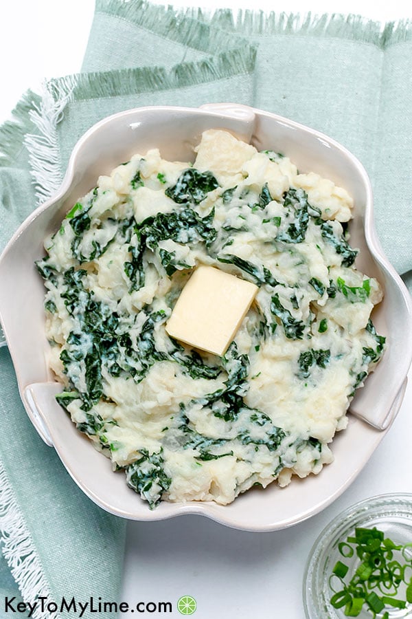 Colcannon mashed potatoes in a white bowl.