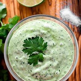 Cilantro lime sauce in a bowl.